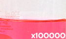 「食用赤色3号 エリスロシン」の水溶希釈例（100000倍）