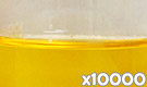「アンナットーWA-20（アナトー色素）」の水溶希釈例（10000倍）