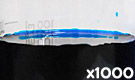 「食用青色1号 ブリリアントブルーFCF」の水溶希釈例（1000倍）
