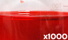 「食用赤色102号 ニューコクシン」の水溶希釈例（1000倍）