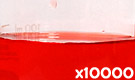 「食用赤色40号 アルラレッドAC」の水溶希釈例（10000倍）